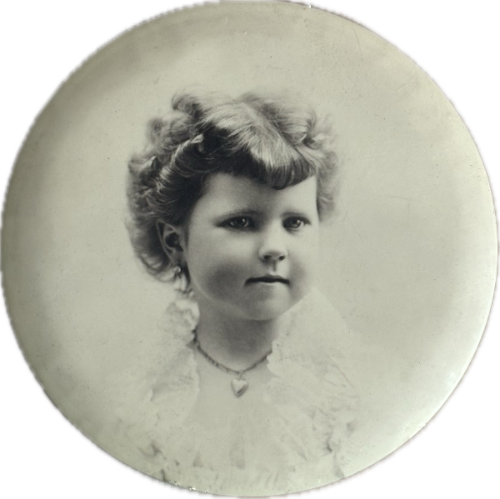 Vintage black and white portrait of a young girl with styled hair.