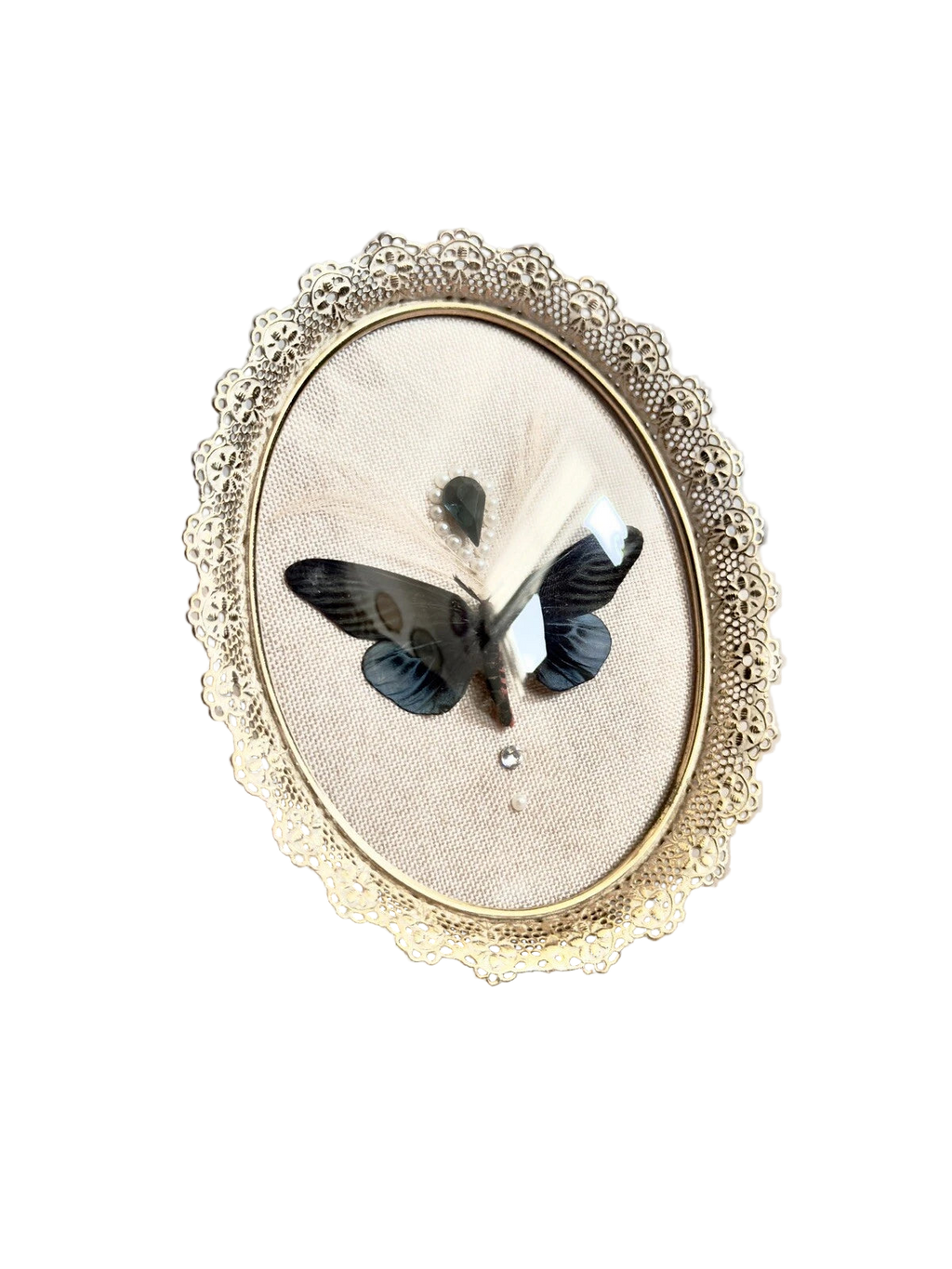 Decorative frame with a butterfly on a neutral background