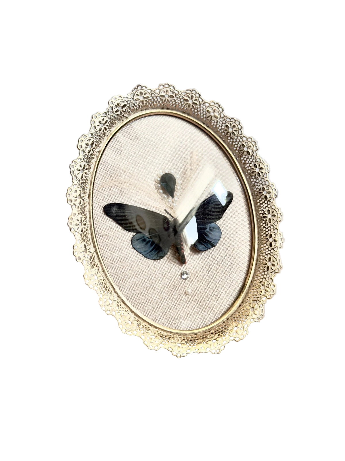 Decorative frame with a butterfly on a neutral background